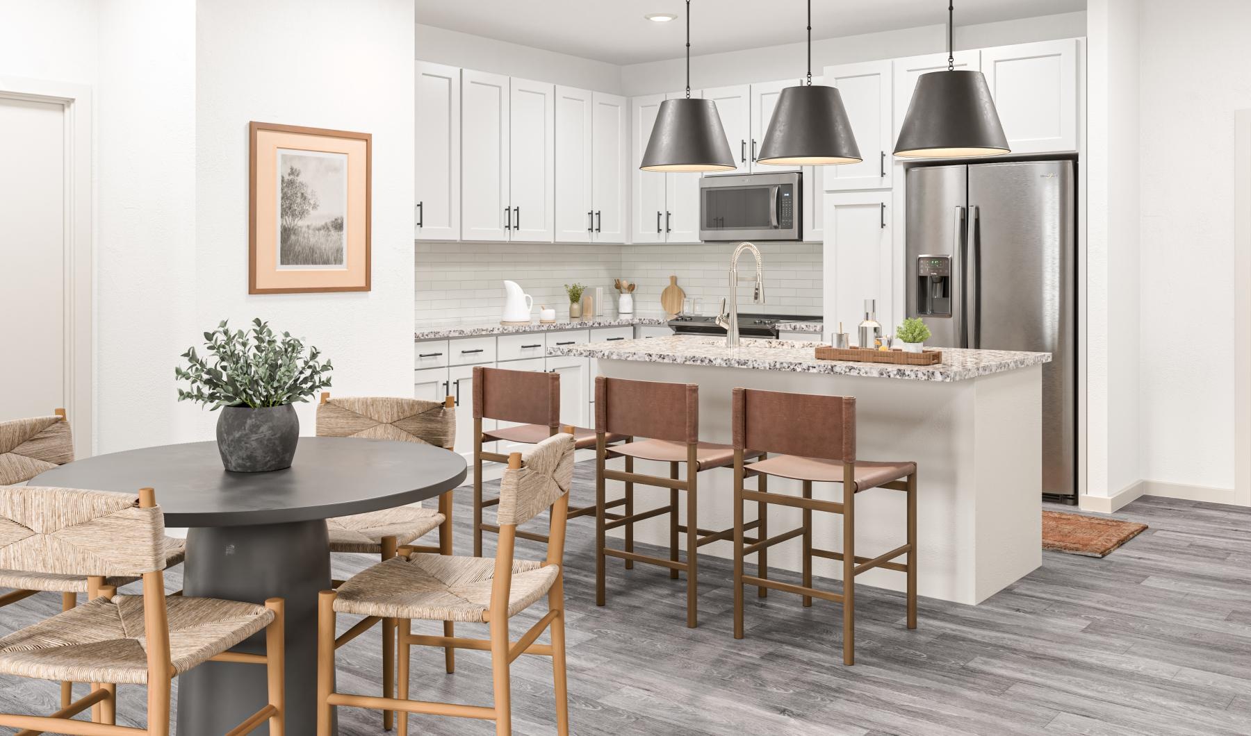 a kitchen with a table and chairs